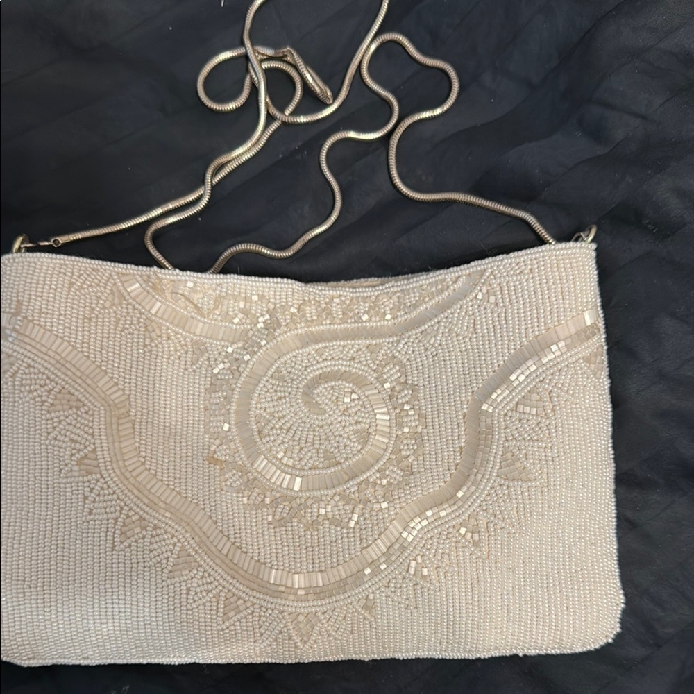 Cream and Gold Wristlet Clutch with Sophisticated Design